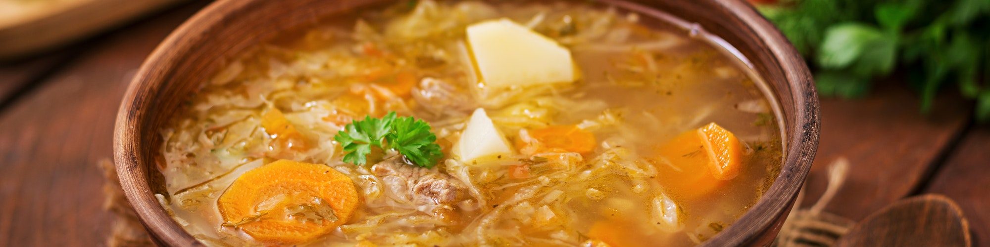 Traditional Russian soup with cabbage - sauerkraut soup.